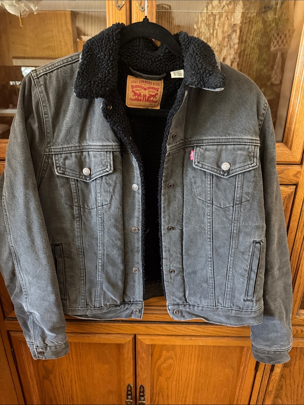 Levi's Black Sherpa-Lined Denim Jacket with Faded Gray Exterior